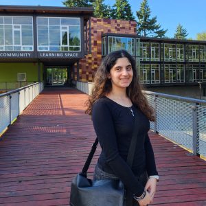 Helin standing in front of a community center.